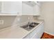 Clean kitchen with light countertops and ample storage, providing a practical cooking area at 58 Monet Nw Ct, Atlanta, GA 30327