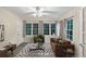 Bright living room with ample natural light, comfortable seating, and modern decor at 58 Monet Nw Ct, Atlanta, GA 30327