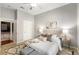 Comfortable bedroom with neutral tones, soft carpet, and natural light at 870 Inman Village Ne Pkwy # 305, Atlanta, GA 30307