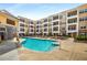 Resort-style pool featuring lounge chairs for relaxation and an attractive apartment complex at 870 Inman Village Ne Pkwy # 305, Atlanta, GA 30307