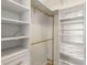 This walk-in closet with custom shelving and storage solutions offers style, organization and function at 870 Inman Village Ne Pkwy # 305, Atlanta, GA 30307