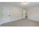 Bedroom with neutral carpeting, a closet, and great natural light at 1172 Oakhurst Trl, Lawrenceville, GA 30043