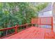 Inviting wooden deck with a lattice railing, offering a perfect spot for outdoor gatherings at 1172 Oakhurst Trl, Lawrenceville, GA 30043