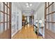 Elegant entryway with hardwood floors, French doors, and stylish decor creating a warm and inviting atmosphere at 130 Holly Reserve Pkwy, Canton, GA 30114