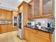 Charming kitchen with stainless steel appliances, granite countertops, and ample cabinet space for storage at 130 Holly Reserve Pkwy, Canton, GA 30114