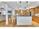 Beautiful kitchen featuring a center island with seating, granite countertops, and ample cabinet space at 130 Holly Reserve Pkwy, Canton, GA 30114