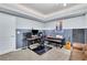 This music room features carpeted floors, custom paint and ample lighting at 130 Holly Reserve Pkwy, Canton, GA 30114