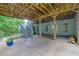 Covered patio area with access to the backyard and upstairs deck at 130 Holly Reserve Pkwy, Canton, GA 30114