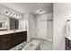 An elegant bathroom shows a dark wood vanity and tile flooring at 2213 Independence Ln, Buford, GA 30519