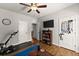Versatile bedroom is equipped with storage solutions, workout equipment, and offers flexible space at 2213 Independence Ln, Buford, GA 30519
