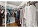 A walk in closet with clothing racks and shelving at 2213 Independence Ln, Buford, GA 30519