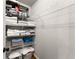 A closet with wire shelving holds towels and boxes at 2213 Independence Ln, Buford, GA 30519