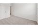 Bedroom featuring neutral carpet, light walls and a closet at 377 Danville Ave, Suwanee, GA 30024