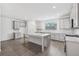 Modern kitchen with granite countertops, stainless steel appliances, and a spacious center island at 377 Danville Ave, Suwanee, GA 30024