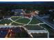 Beautifully landscaped amphitheater with tiered seating, surrounded by lush greenery and enhanced by evening lighting at 515 Dover St, Marietta, GA 30066