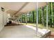 Covered back porch overlooking private backyard with plenty of room for outdoor relaxation and entertaining at 515 Dover St, Marietta, GA 30066