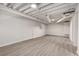 Spacious basement area showcasing a clean, bright aesthetic with ample room for various recreational activities and storage at 515 Dover St, Marietta, GA 30066
