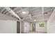 Bright basement featuring neutral paint, modern lighting, and sleek wood-look flooring, perfect for flexible living space at 515 Dover St, Marietta, GA 30066