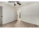Bright, neutral bedroom features a modern ceiling fan and gray-tone hard wood floor at 515 Dover St, Marietta, GA 30066