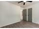 Bright, neutral bedroom features a modern ceiling fan and gray-tone hard wood floor at 515 Dover St, Marietta, GA 30066