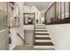 Inviting foyer showcases a staircase and elegant railing, setting a sophisticated tone at 515 Dover St, Marietta, GA 30066