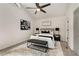 Stylish bedroom featuring vaulted ceilings, modern decor, and ample natural light at 515 Dover St, Marietta, GA 30066