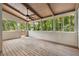Inviting screened porch with wooded views, perfect for enjoying the outdoors at 515 Dover St, Marietta, GA 30066