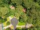 An aerial view of the property's wooded surroundings and neighborhood at 5848 Kingswood Ct, Norcross, GA 30093