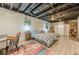 Finished basement bedroom with exposed ceiling, twin beds, and desk work space at 5848 Kingswood Ct, Norcross, GA 30093