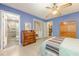 A spacious bedroom features an attached bathroom and a walk-in closet at 5848 Kingswood Ct, Norcross, GA 30093