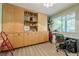 Bonus room with a window and built-in storage plus an office space at 5848 Kingswood Ct, Norcross, GA 30093