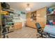 Spacious bonus room includes built-in cabinets and shelving plus storage at 5848 Kingswood Ct, Norcross, GA 30093