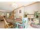 Cozy dining area with natural light and decorative accents near the living room entrance at 5848 Kingswood Ct, Norcross, GA 30093