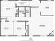 First floor plan featuring kitchen, living room, bedrooms, and bathrooms at 5848 Kingswood Ct, Norcross, GA 30093