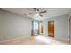 This bedroom includes a ceiling fan and neutral walls ready for personalization at 5868 Kingswood Nw Ct, Norcross, GA 30093