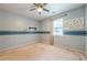 This bedroom includes a ceiling fan, window, and playful decor, great for  at 5868 Kingswood Nw Ct, Norcross, GA 30093