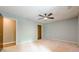 This bedroom includes a ceiling fan and neutral walls ready for personalization at 5868 Kingswood Nw Ct, Norcross, GA 30093