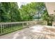 Large wooden deck overlooking the backyard, ideal for entertaining or relaxing outdoors at 5868 Kingswood Nw Ct, Norcross, GA 30093