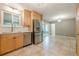Bright eat-in kitchen boasting stainless steel appliances and access to sunroom at 5868 Kingswood Nw Ct, Norcross, GA 30093