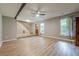 View of the living room, staircase, entryway and luxury vinyl plank flooring at 5868 Kingswood Nw Ct, Norcross, GA 30093