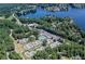 Aerial view of the community showing tennis courts, parking, and access to the lake at 121 Clipper Bay Drive, Alpharetta, GA 30005