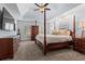 Spacious main bedroom features a tray ceiling and plenty of natural light at 121 Clipper Bay Drive, Alpharetta, GA 30005