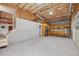 Unfinished basement featuring exposed ceiling and a partial kitchen area at 1232 Everton Pl, Cumming, GA 30041