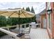 Outdoor deck with patio table and stainless steel grill perfect for entertaining at 1232 Everton Pl, Cumming, GA 30041