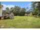 Spacious backyard with a lush lawn, and a deck perfect for relaxing and enjoying the outdoors at 1250 Timber Walk Dr, Loganville, GA 30052