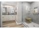 Updated bathroom featuring a glass-enclosed shower and double vanity with modern fixtures at 1250 Timber Walk Dr, Loganville, GA 30052