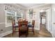 Eat-in kitchen nook with a view and direct access to the laundry room and backyard at 1250 Timber Walk Dr, Loganville, GA 30052