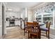 Charming kitchen with a breakfast nook bathed in natural light and a full complement of appliances at 1250 Timber Walk Dr, Loganville, GA 30052