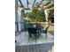Outdoor patio featuring a wooden pergola, stylish rug, and comfortable seating, perfect for relaxing and entertaining at 1250 Timber Walk Dr, Loganville, GA 30052