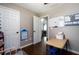 Neutral bedroom featuring hardwood floors, white trim, and a small work area at 19 Autumn Ne Pl, White, GA 30184